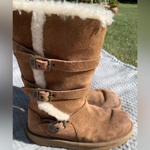 Authentic Ugg Maddi three buckle boots. Size 4 Gently used/clean.